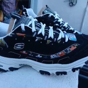 Black/floral skechers shoes. Never used